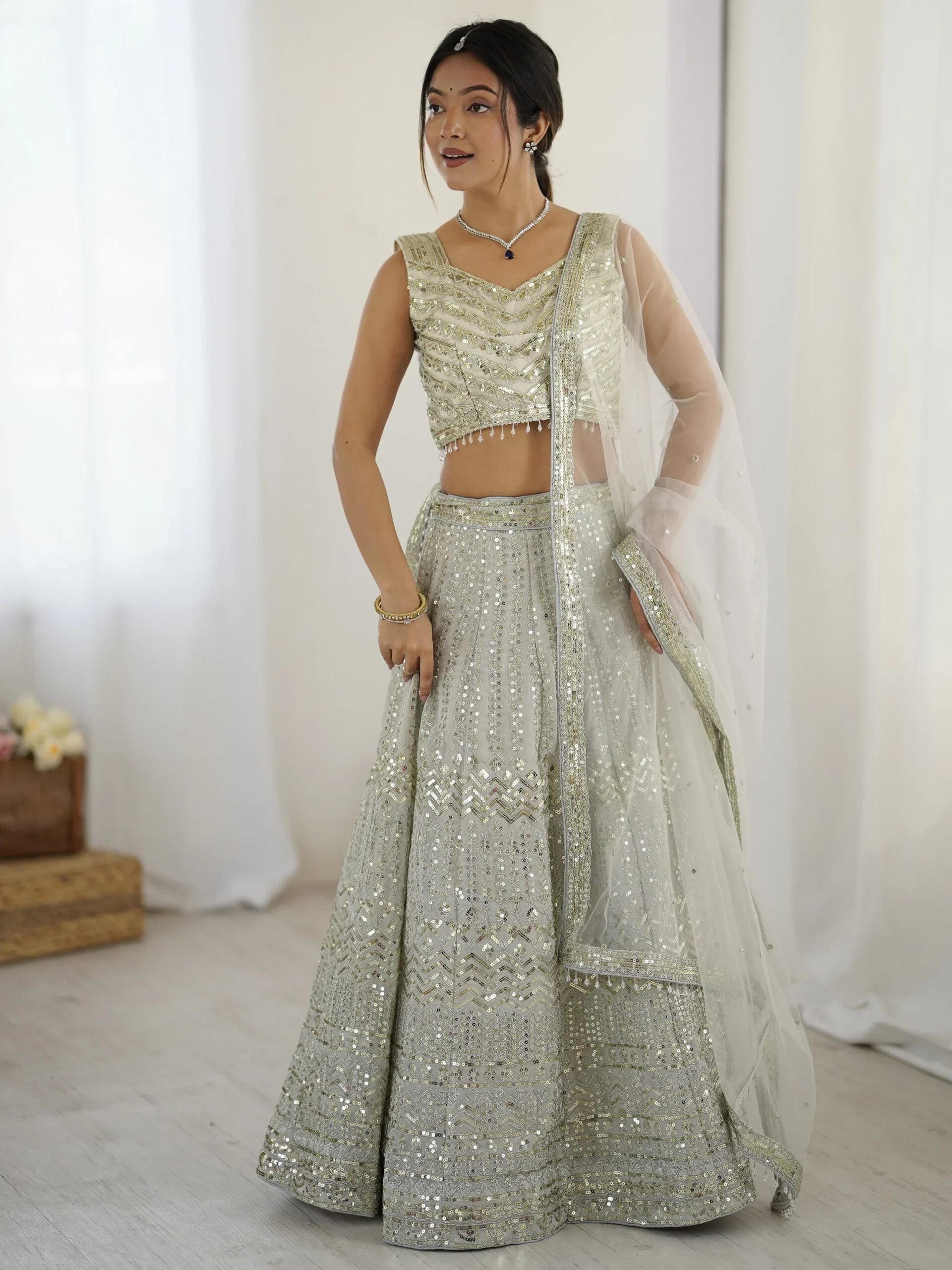 luxurious-off-white-georgette-sequins-bridemaids-lehenga-choli-6192865.jpg