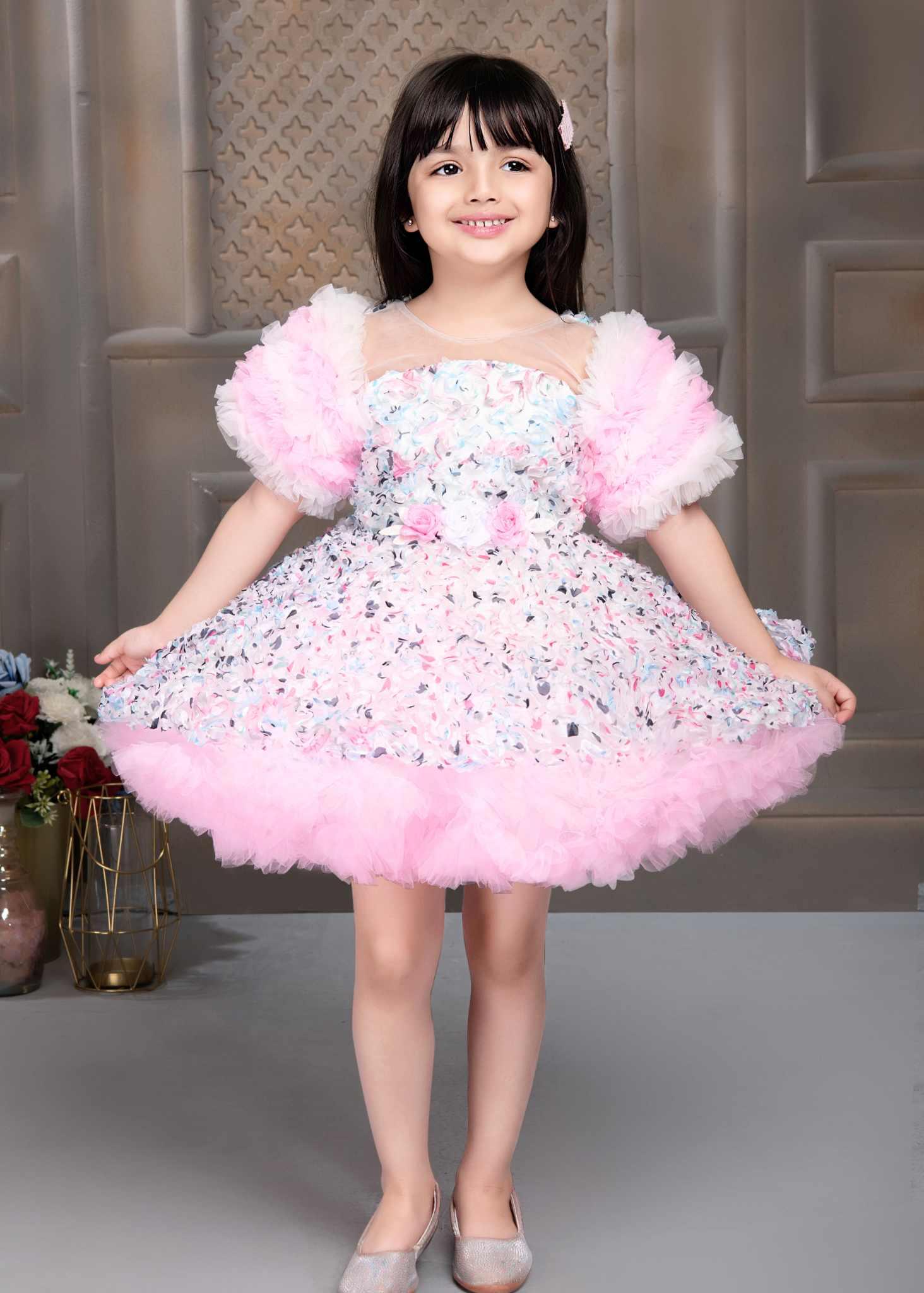 floral-printed-bushy-net-pink-frock-with-ruffled-net-sleeves-for-girls-lagorii-kids-1.jpg